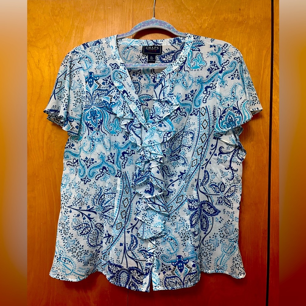 Floral, ruffled blouse.